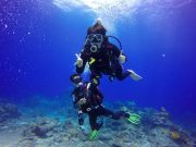 honeymoon couple underwater diving in andaman