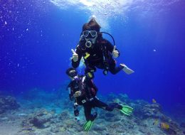 honeymoon couple underwater diving in andaman